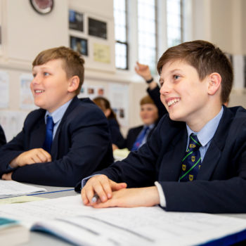 senior boys in lesson smiling